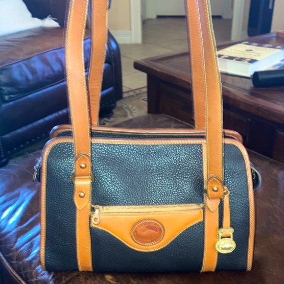 Dooney & Bourke Handbags - Dooney & Bourke Vintage All Weather Leather Black and Brown Shoulder Bag